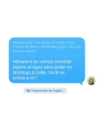 Recurso Tradução ao Vivo no Mensagens em uso, mostrando a tradução do inglês para o espanhol