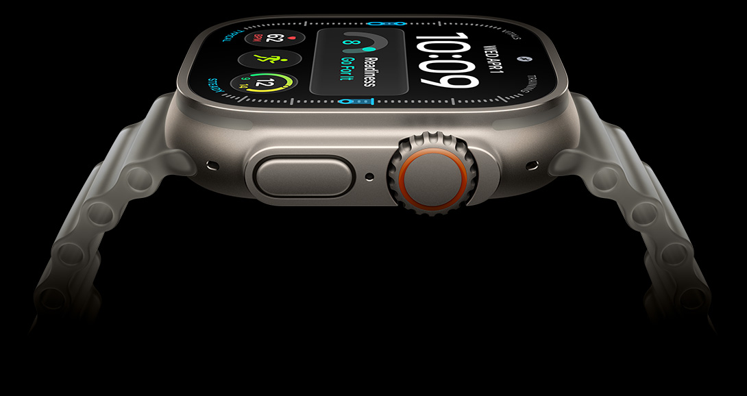 Apple Watch Ultra 4, side view, titanium case, silver colour, digital time display, health and fitness metrics, orange Digital Crown side button