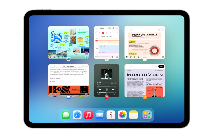 iPad, landscape orientation, screen shows multiple apps like Calendar and Music app in six windows lined up in two rows to show windows equally
