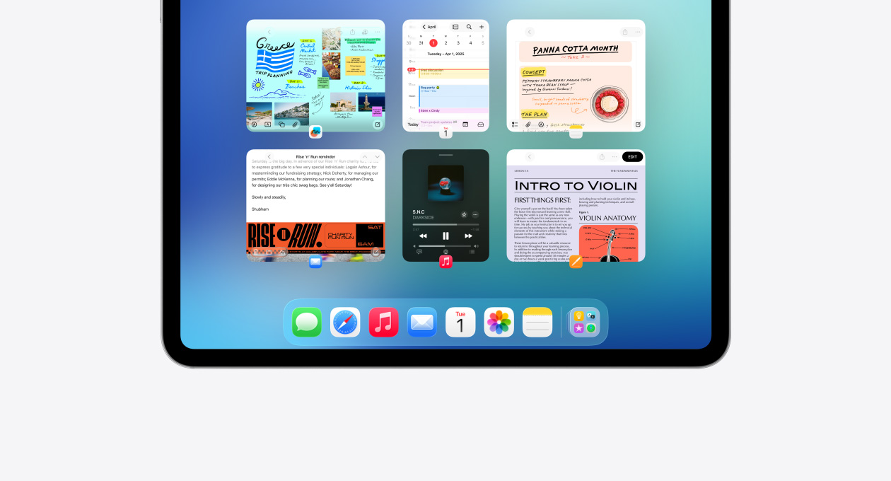 iPad vaaka-asennossa, avoinna kuusi ikkunaa kahdessa rivissä, mukana Kalenteri-appi, Muistiinpanot-appi, Apple Music ja Safari