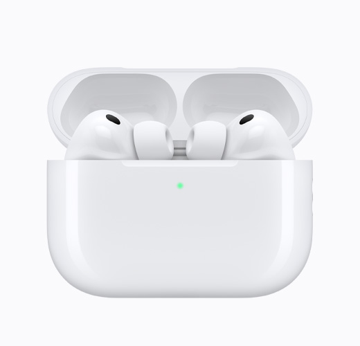AirPods 5 inside an open white charging case