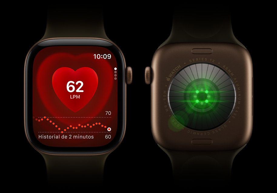Dos dispositivos Apple Watch Series 12 uno al lado del otro, vista frontal de un Apple Watch Series 12 a la izquierda, la pantalla muestra el monitor de frecuencia cardiaca, vista posterior de un Apple Watch Series 12 a la derecha, luces brillantes, color verde