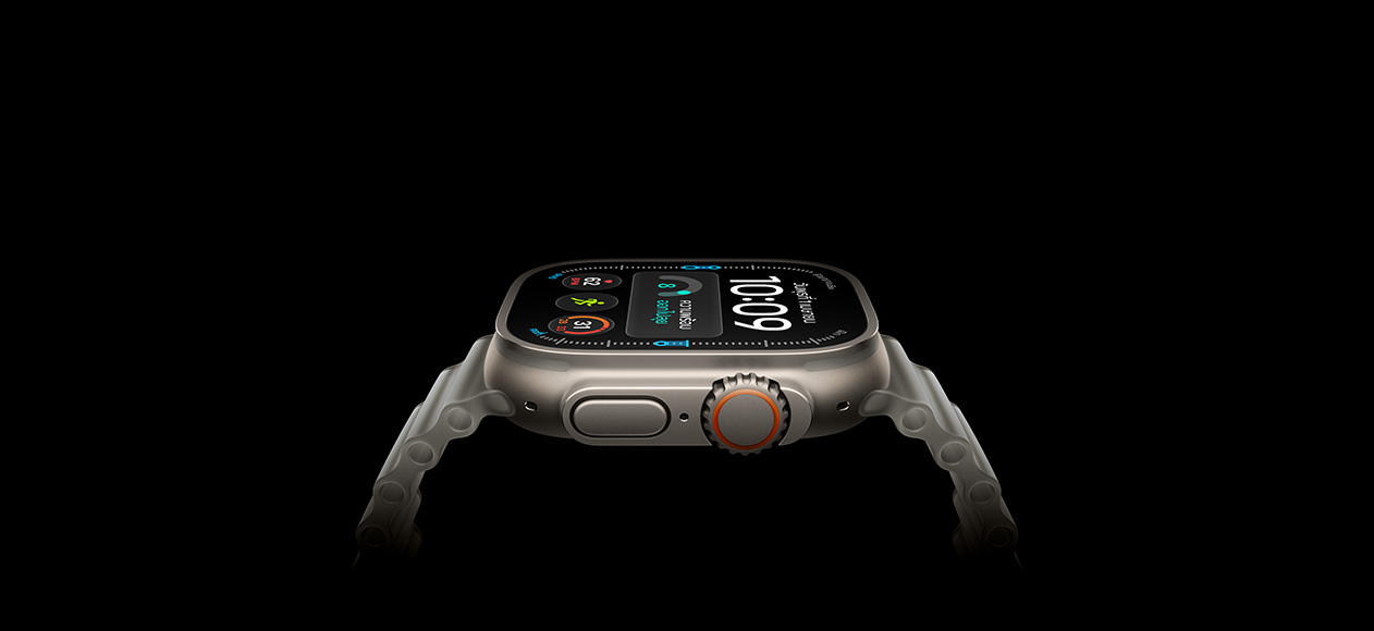 Apple Watch Ultra 4, titanium case, natural color, right exterior, Digital Crown, raised side button, digital watch face, translucent gray Ocean Band