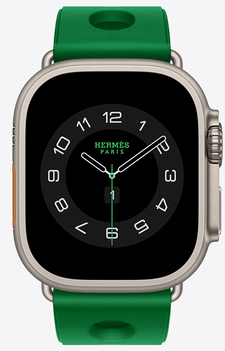原色鈦金屬錶殼 Apple Watch Hermès Ultra 4,採用 Circulaire 指針錶面 (小時、分鐘與秒針,以及多項複雜功能,包括天氣、活動記錄圓圈、巴黎時間與紫外線指數),右側外觀上有數位錶冠、凸起的側邊按鈕,搭配 Vert Vertigo 炫綠色 (亮綠色系) Scub'H Diving 錶帶,錶帶由橡膠材質模塑成型,中央有圓孔鏤空設計