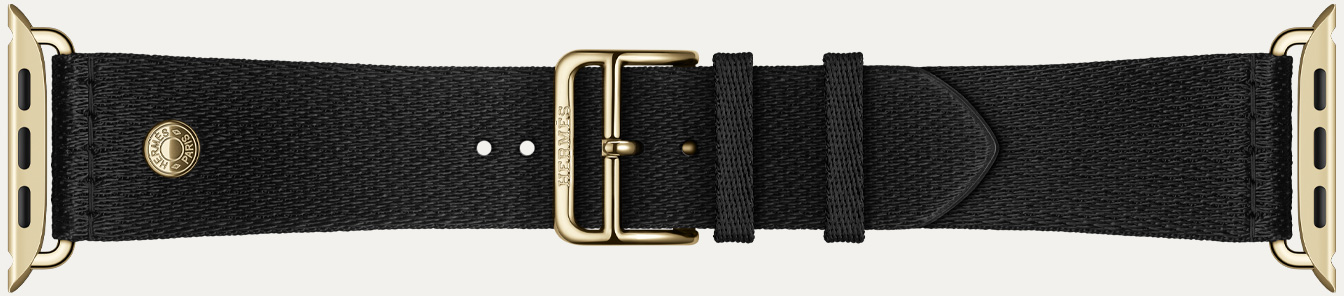 Apple Watch Hermès Series 12 Noir Satin Clou de Selle band detail, smooth black satin webbing with radiant gold hardware
