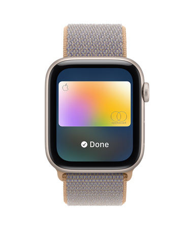 Apple Watch SE 3, aluminum case, starlight color, screen shows Wallet, payment card graphic, right side exterior, Digital Crown dial, Sport Loop band, chambray blue color (light blue-gray)