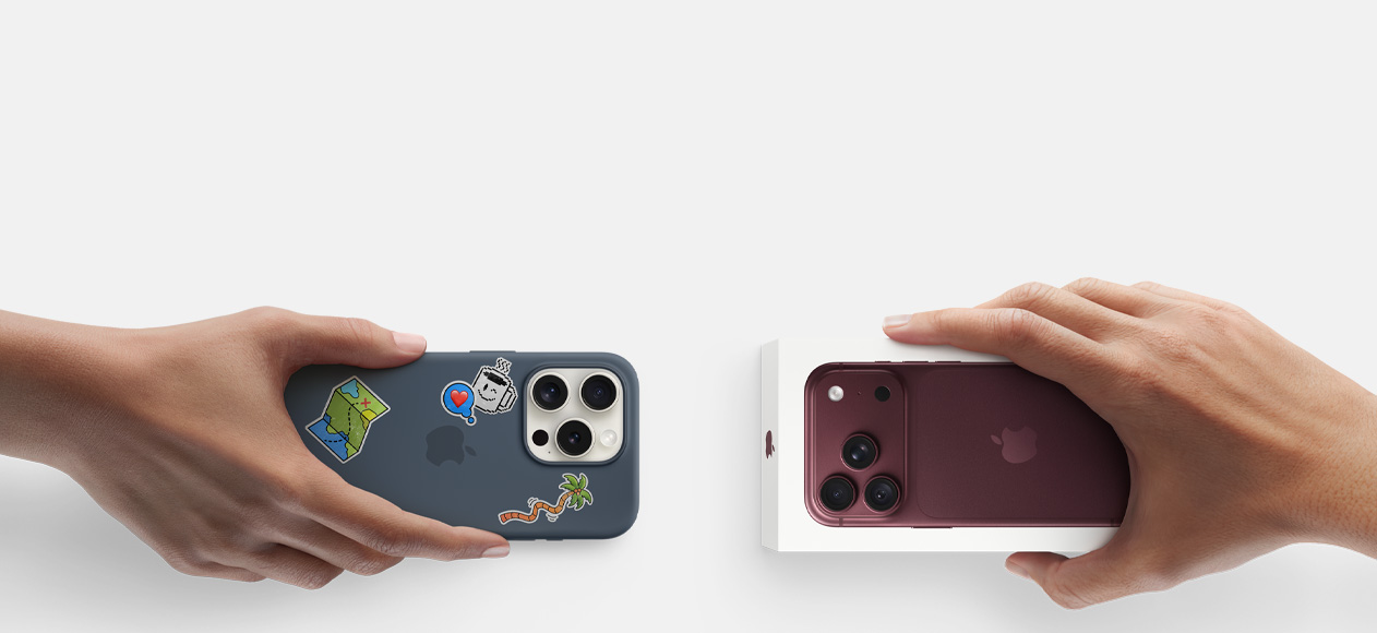 Hænder bytter en sølvfarvet iPhone 17 Pro med silikone-etui og klistermærker på bagsiden til en ny bordeaux iPhone 18 Pro i en æske.