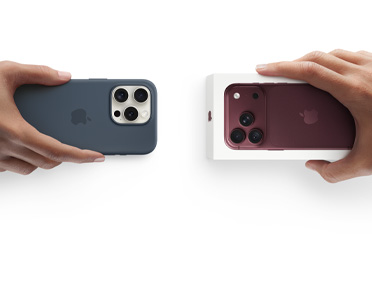 Hands exchanging trade-in iPhone 17 with Silicon cover, for new iPhone 18 Pro in the box.