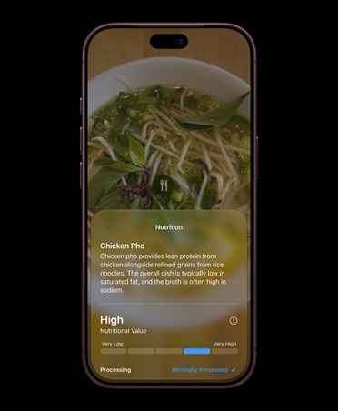 iPhone 18 Pro, Burgundy, screen displays in Siri mode in Camera interface, showing nutrition facts about a food item identified with Visual Intelligence, screen shows detailed information about chicken phở, including common ingredients and nutrition information